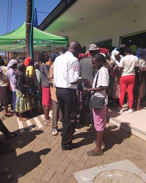 Elderly persons rush to register SIM cards for stipends