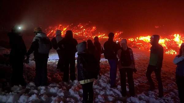 Experts warn of hazards as Mount Etna eruption draws surge of visitors