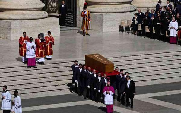 Crowds applaud Pope's coffin as Vatican funeral begins