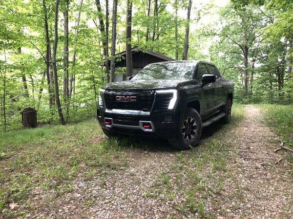 View Photos of the 2026 GMC Sierra EV AT4